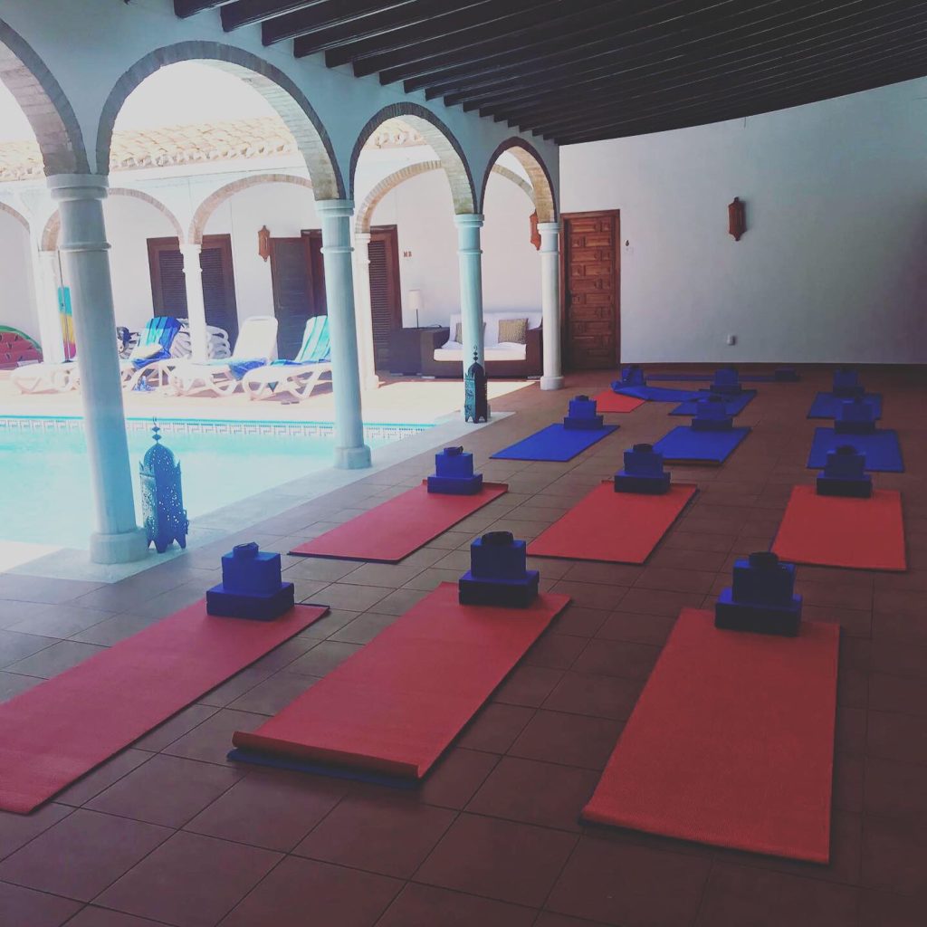 Justine Walker Yoga by pool